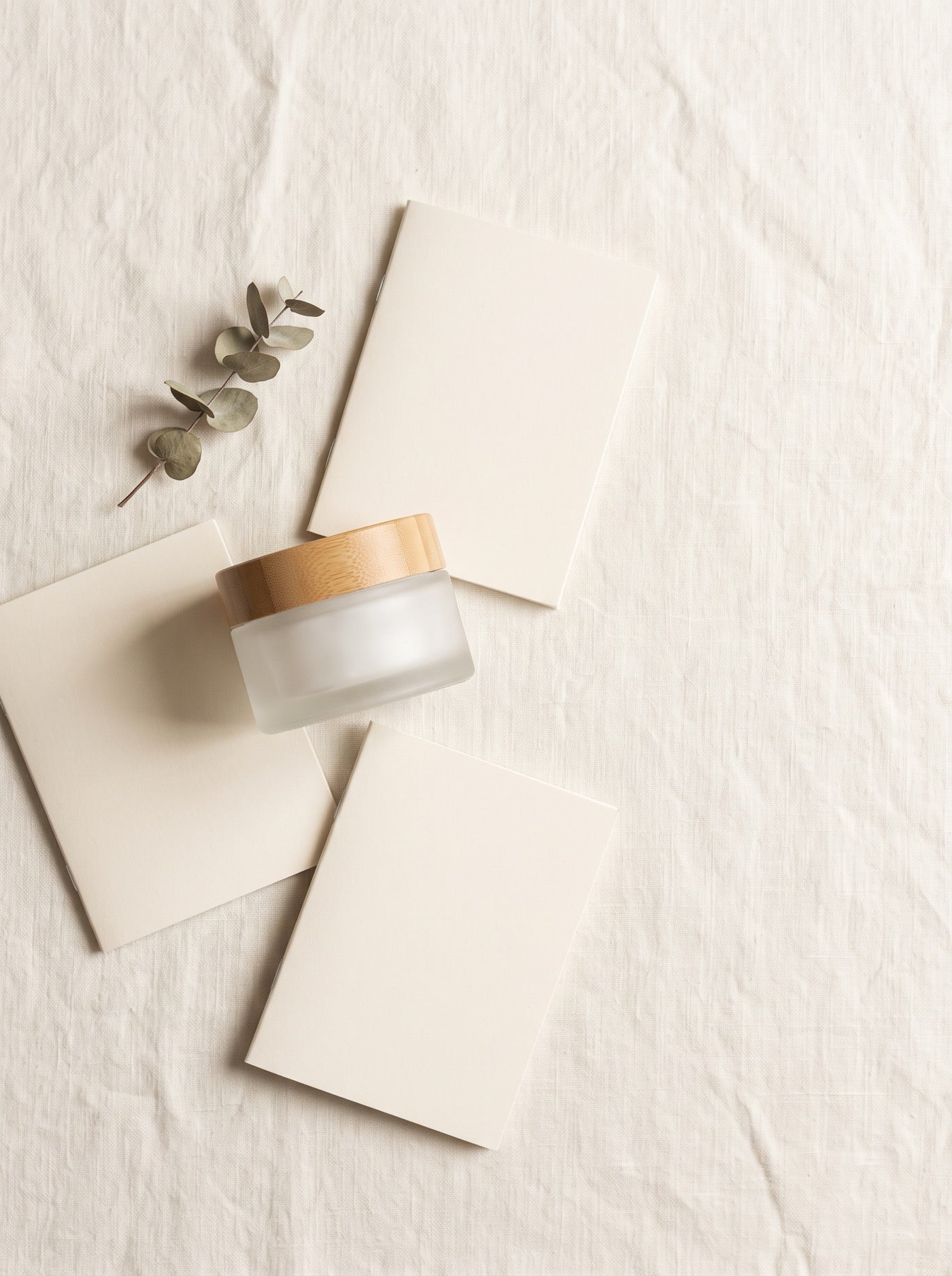 Flat-lay of the balm jar with the guide and journal