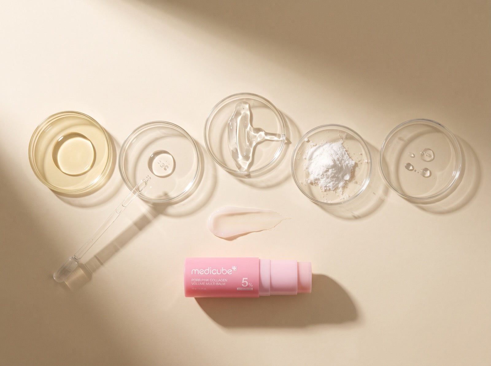 Five glass dishes of the balm's actives